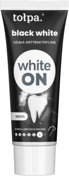 Pasta Tołpa Black White wybielająca z węglem aktywnym, czarna tubka z białym napisem white ON, widok z przodu.