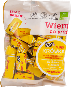 Przezroczysta torebka wegańskich krówek bananowych Super Krówka, widok z przodu, z indywidualnymi cukierkami.