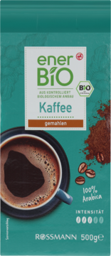 Zielona torebka enerBIO Rossmann kawa mielona 500g, 100% Arabica, intensywność 3, z filiżanką na froncie.
