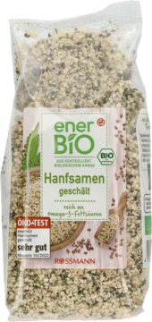 Przezroczysta torebka enerBiO Hanfsamen geschält (łuskane nasiona konopi), etykieta "ÖKO-TEST bardzo dobre", widok z przodu.