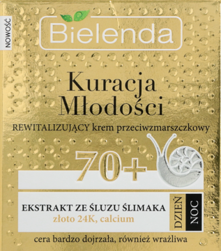 Złote pudełko kremu Bielenda Kuracja Młodości 70+ z napisem „REWITALIZUJĄCY krem przeciwzmarszczkowy”, widok z przodu.