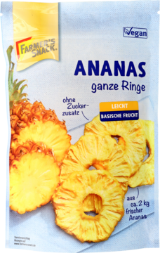 Biało-niebieskie opakowanie suszonych krążków ananasa Farmers Snack, z owocami i napisem "Ananas ganze Ringe".