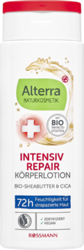 Alterra Intensiv Repair balsam do ciała w białej butelce z czerwoną zakrętką. Masło Shea, Cica, 72h nawilżenia, przód.