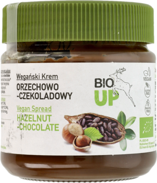 Ekologiczny krem orzechowo-czekoladowy BIO UP w szklanym słoiku z zieloną nakrętką, widok z przodu.