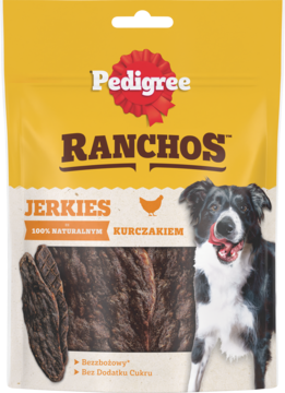 Pedigree Ranchos Jerkies z kurczakiem, bezzbożowe przysmaki. Żółte opakowanie z psem i widocznymi kawałkami jerky.