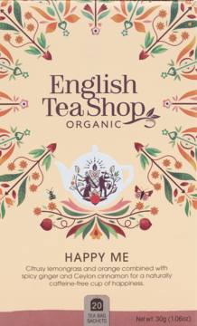English Tea Shop Happy Me Organic herbata ziołowa, beżowe pudełko z dzbankiem, trawa cytrynowa, pomarańcza, imbir.