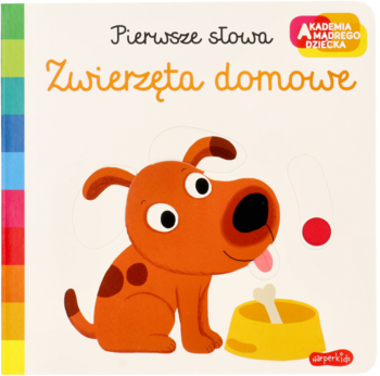 Okładka książki "Pierwsze słowa Zwierzęta domowe" z wesołym brązowym psem, piłką i miską z kością.