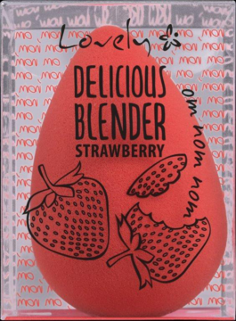 Czerwona gąbeczka do makijażu w kształcie kropli z napisem "Delicious Blender Strawberry" w przezroczystym pudełku.