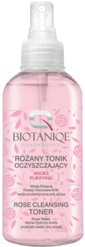 Biotaniqe Różany Tonik Oczyszczający, mikrooczyszczający, w przezroczystej butelce z różowym płynem, widok z przodu.