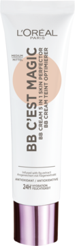 Biała tubka L'Oréal Paris BB C'est Magic Medium BB Cream 5-in-1 Skin Perfector z brzoskwiniowym kółkiem na froncie, widok z przodu.