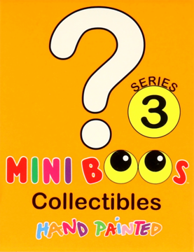 Frontalne opakowanie Mini Boos Collectibles Series 3 na pomarańczowym tle z dużym białym znakiem zapytania i napisem "ręcznie malowane".