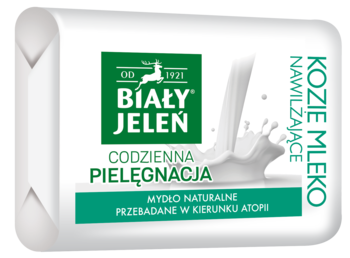 Biały Jeleń mydło naturalne z kozim mlekiem, biało-zielone opakowanie, nawilżające dla skóry atopowej, widok z przodu.
