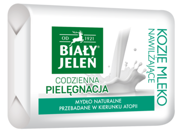 Biały Jeleń mydło naturalne z kozim mlekiem, biało-zielone opakowanie, nawilżające dla skóry atopowej, widok z przodu.