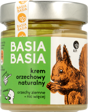 Słoik masła orzechowego Basia Basia z zieloną etykietą i wiewiórką, z przodu napis „naturalny krem orzechowy”.