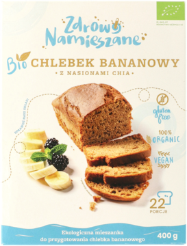 Białe opakowanie Zdrowo Namieszane Bio Chlebek Bananowy z nasionami chia, z obrazkiem pieczywa i owoców, widok z przodu.