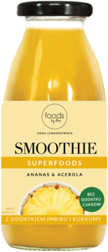 Żółty smoothie Foods by Ann Ananas & Acerola z imbirem, kurkumą i bez cukru, w szklanej butelce.