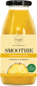 Żółty smoothie Foods by Ann Ananas & Acerola z imbirem, kurkumą i bez cukru, w szklanej butelce.