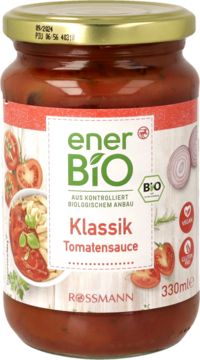Słoik organicznego sosu pomidorowego EnerBIO Klassik, czerwona etykieta z ilustracją pomidorów i pasty, 330ml.