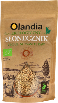 Ekologiczny słonecznik łuskany Olandia w brązowej torbie kraft, widok z przodu, z okienkiem na ziarna.