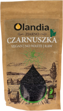 Brązowa torebka Olandia Czarnuszka ziarno z przezroczystym okienkiem w kształcie kropli, pełna czarnych ziaren.
