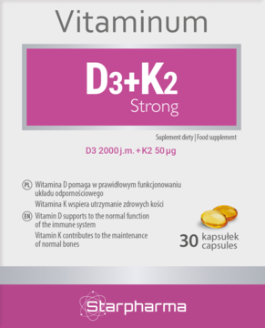 Białe opakowanie suplementu Starpharma Vitaminum D3+K2 Strong, z magenta pasem i złotymi kapsułkami, widok z przodu.