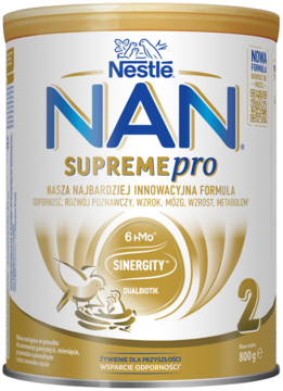 Złoto-biała puszka mleka modyfikowanego NAN SUPREMEpro 2 Nestlé, widok z przodu, z grafiką ptaków.