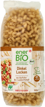 Paczka bio makaronu enerBiO Dinkel Locken Rossmann, brązowe świderki orkiszowe, na etykiecie danie z sosem.