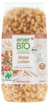 Przezroczyste opakowanie makaronu enerBIO Dinkel Locken 500g, z etykietą i widocznymi orkiszowymi lokami.