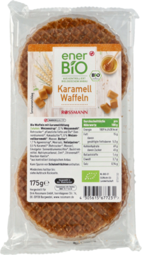 EnerBio Karmelowe Wafle: Dwie okrągłe, złocistobrązowe wafle w przezroczystym opakowaniu, z etykietą Rossmann.