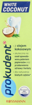 Frontal view of Prokudent White Coconut toothpaste box, light green, with tooth & coconut graphic, for natural white teeth.