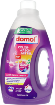 Fioletowy płyn do prania Domol Color w butelce 1,1l, aktywny od 20°C, widok z przodu.