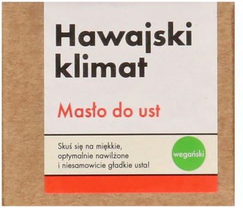 Hawajski klimat Masło do ust w brązowym opakowaniu, biała etykieta z czerwonym napisem i zielonym symbolem, widok z przodu.