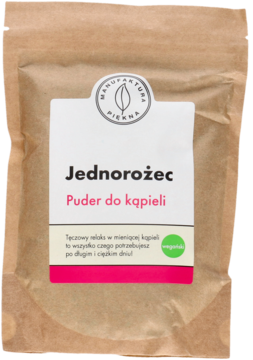 Puder do kąpieli Jednorożec Manufaktura Piękna, brązowa torebka z białą etykietą i różowym napisem, widok z przodu.