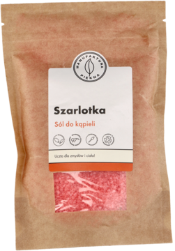 Brązowa papierowa torebka soli do kąpieli Szarlotka z różową zawartością i białą etykietą, widok z przodu.