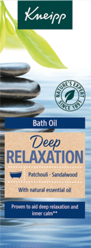 Kneipp Bath Oil Deep Relaxation Patchouli Sandalwood, blue-brown packaging with stacked stones, green leaves.