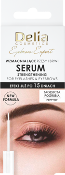 Biało-złote opakowanie serum Delia Eyebrow Expert wzmacniającego rzęsy i brwi, z okiem i aplikatorem.