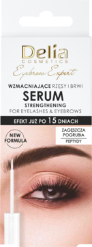 Biało-złote opakowanie serum Delia Eyebrow Expert wzmacniającego rzęsy i brwi, z okiem i aplikatorem.