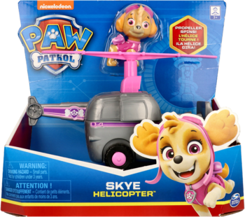 Zabawka Psi Patrol: helikopter Skye w pudełku. Szaro-różowy pojazd z figurką Skye, widok frontowy opakowania.