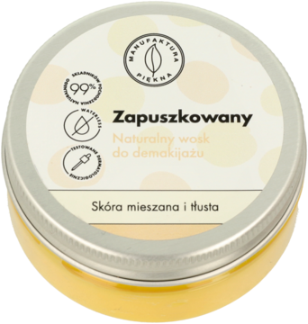 Srebrna puszka z żółtym woskiem Manufaktura Piękna "Zapuszkowany" do demakijażu, widok z góry.