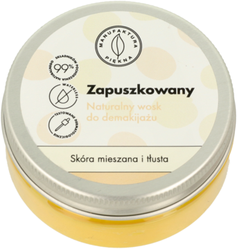 Srebrna puszka z żółtym woskiem Manufaktura Piękna "Zapuszkowany" do demakijażu, widok z góry.