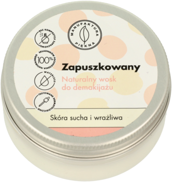 Zapuszkowany naturalny wosk do demakijażu w srebrnej puszce z beżowo-różowym wieczkiem w kropki, widok z góry.