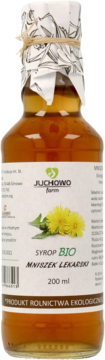 Bursztynowy syrop BIO Mniszek Lekarski Juchowo farm 200ml, w butelce z etykietą i dekoracyjnym papierem.