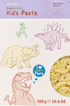 Opakowanie organicznego makaronu ALB-GOLD Kid's Pasta w kształcie dinozaurów, z kolorowymi ilustracjami dinozaurów i okienkiem.