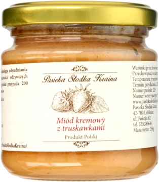 Słoik kremowego miodu truskawkowego z białą etykietą i rysunkami truskawek, złota nakrętka, widok z przodu.