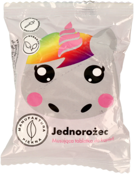 Musująca tabletka do kąpieli Jednorożec w przezroczystej torbie. Produkt w kształcie głowy jednorożca z tęczową grzywą i różowym rogiem, widok z przodu.