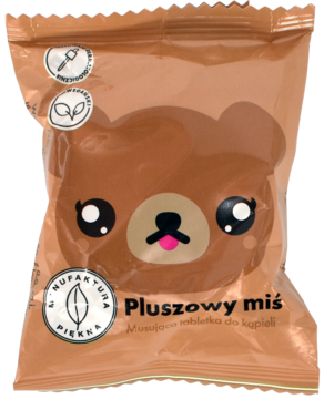 Brązowy sachet Manufaktury Piękna Pluszowy Miś, tabletka kąpielowa z twarzą misia, widok z przodu.