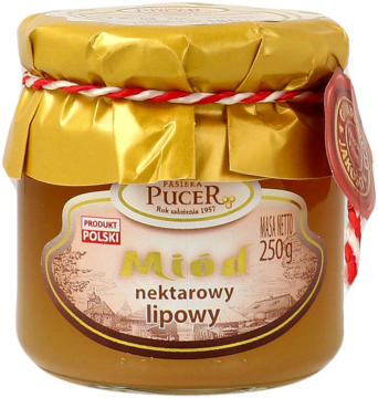 Słoik polskiego miodu nektarowego lipowego Pucer, 250g, złote wieczko z czerwoną wstążką, beżowa etykieta.