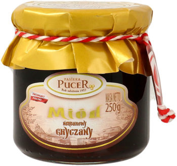 Frontalny widok polskiego miodu gryczanego Pucer 250g w słoiku z ciemnym miodem, złotym wieczkiem.