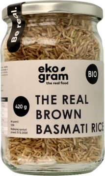 Frontalny widok szklanego słoika eko gram z BIO brązowym ryżem basmati 420g, z etykietą "THE REAL BROWN BASMATI RICE".