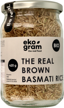 Frontalny widok szklanego słoika eko gram z BIO brązowym ryżem basmati 420g, z etykietą "THE REAL BROWN BASMATI RICE".